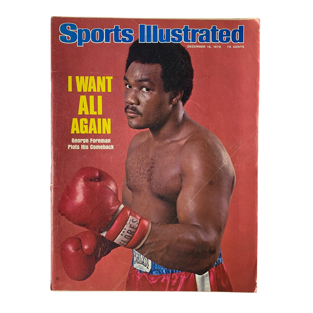 Cover of Sports Illustrated Magazine from December 15, 1975 featuring George Foreman with the title 'I Want Ali Again', highlighting his return to boxing.