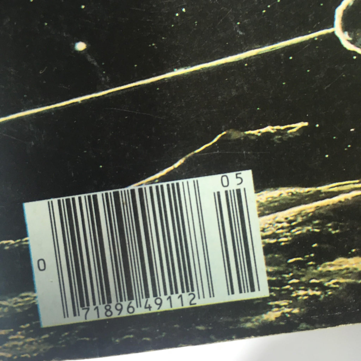 Back cover of Starlog Magazine Number 13 including barcode and cosmic background, highlighting the magazine's sci-fi theme.