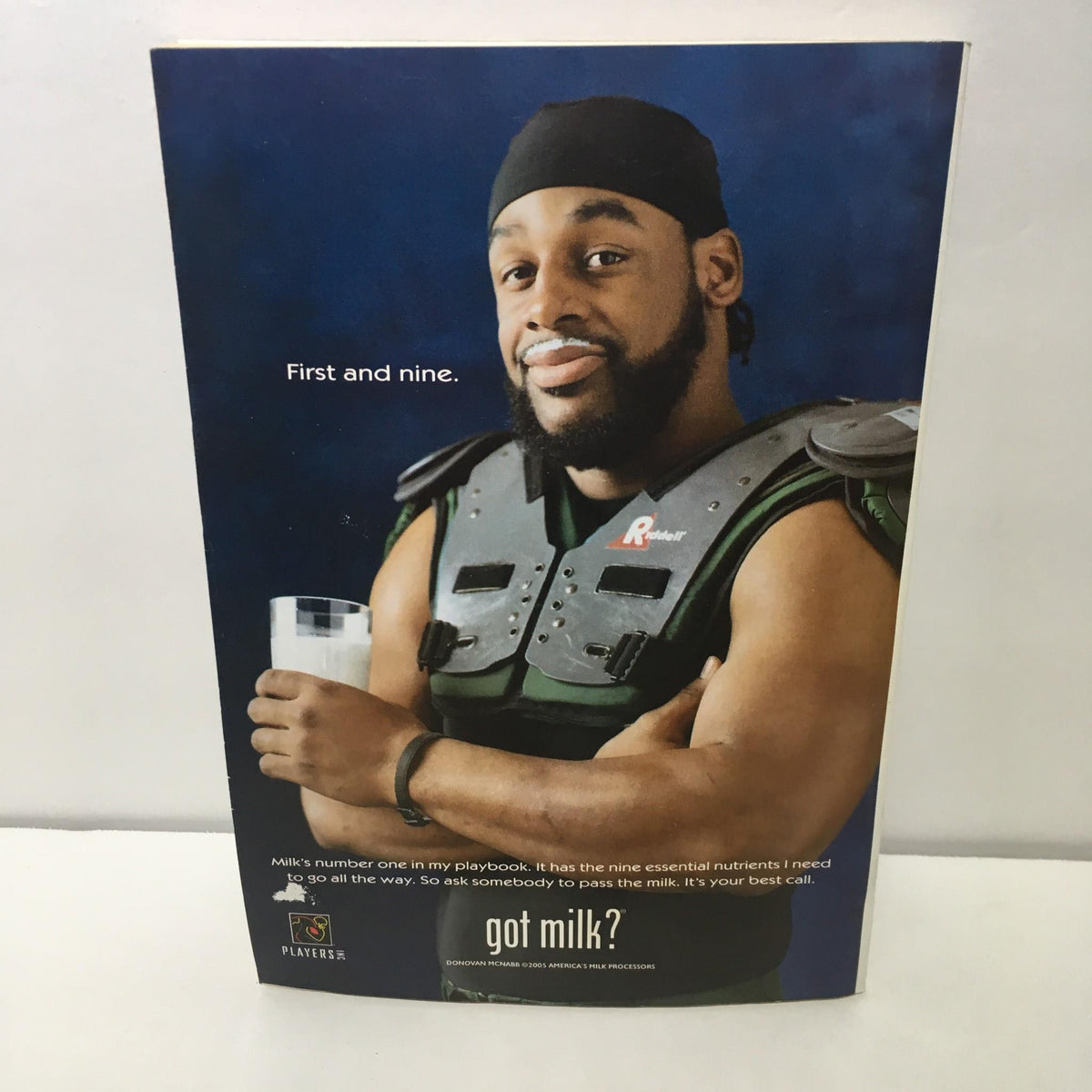 Advertisement featuring a player holding a glass of milk with the text "First and nine" from the TV Guide Sept 4-10 2005 highlighting Tom Brady quarterback for the Patriots NFL 2005 Preview.