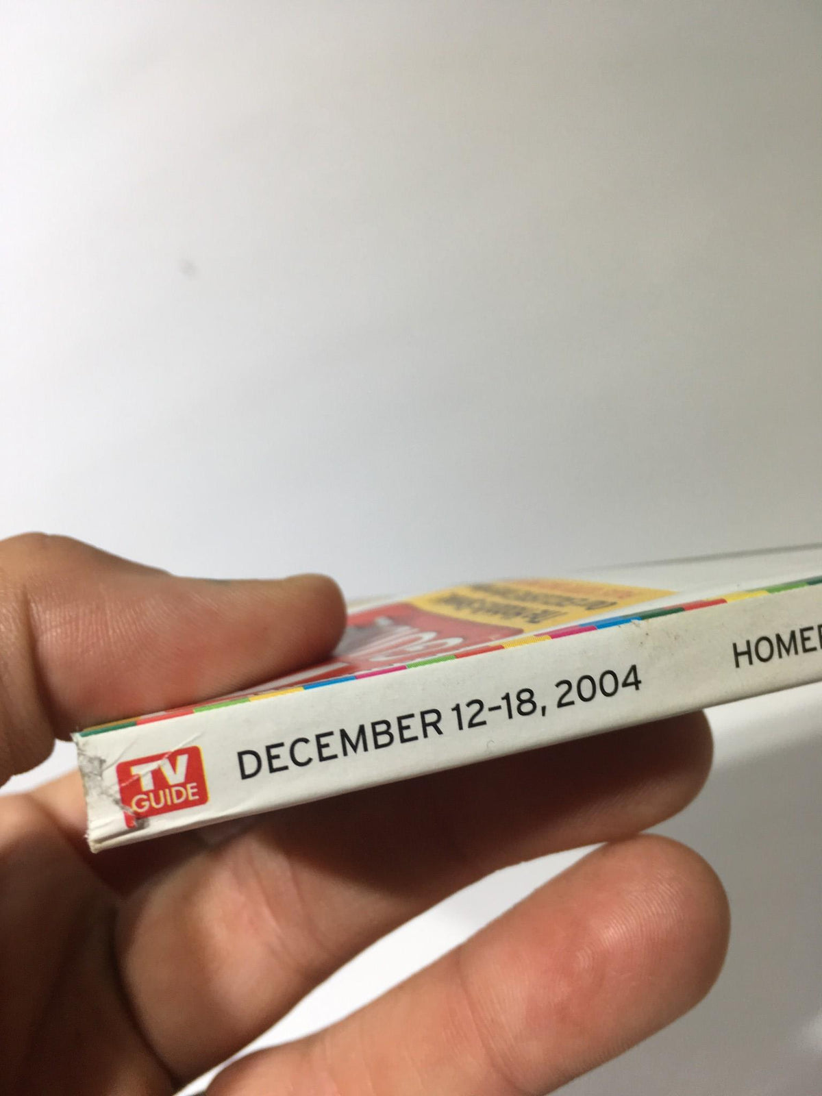 Side view of TV Guide December 12-18 2004 with the issue date prominently displayed, showcasing the publication's design.