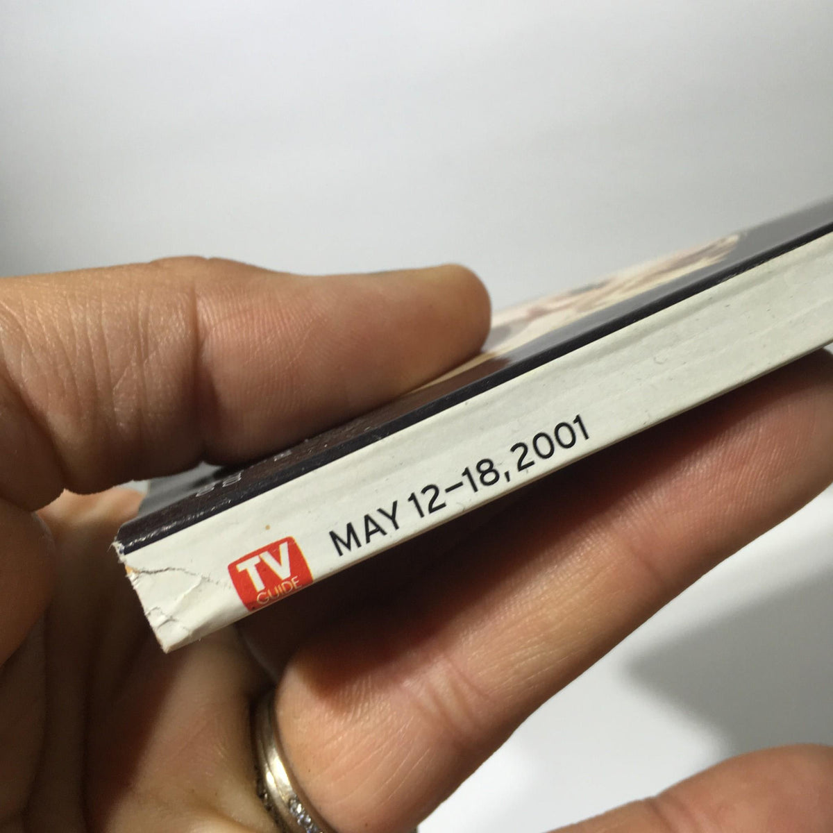 Side view of the TV Guide May 12-18, 2001, showing the date printed on the spine.