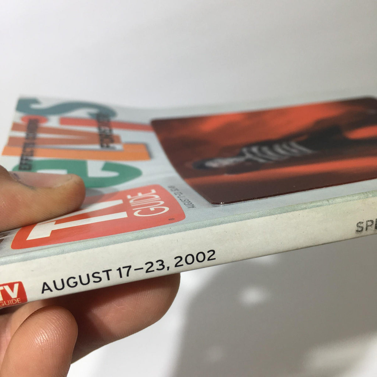 Spine view of TV Guide August 17-23 2002 showcasing the publication date prominently printed.