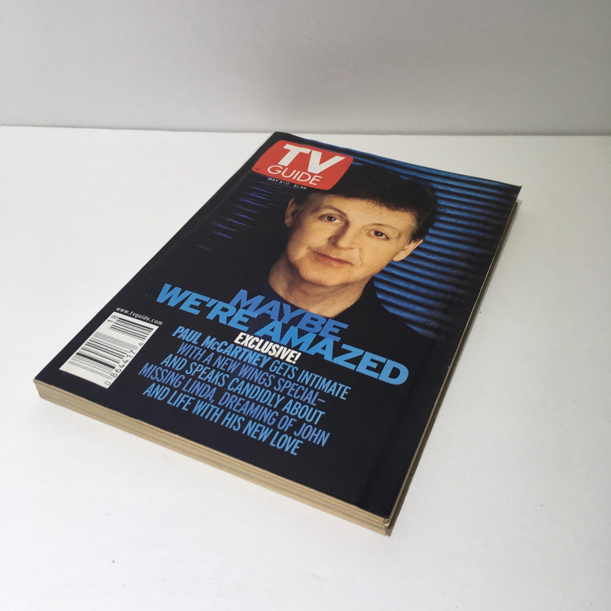 Cover of TV Guide May 5-11 2001, featuring Paul McCartney with the title 'Maybe We're Amazed'. The cover showcases an intimate interview with the artist.