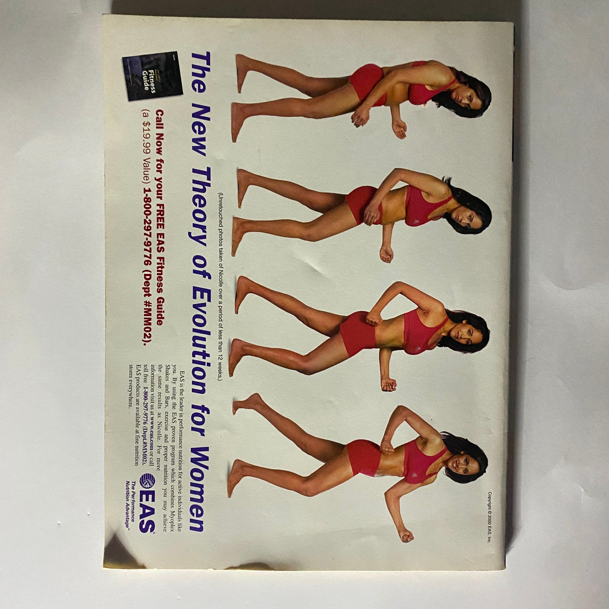 Muscle Media Magazine September 2000 featuring a fitness advertisement with multiple images of a woman in red sportswear, showcasing the 'New Theory of Evolution for Women', promoting women's fitness and health.