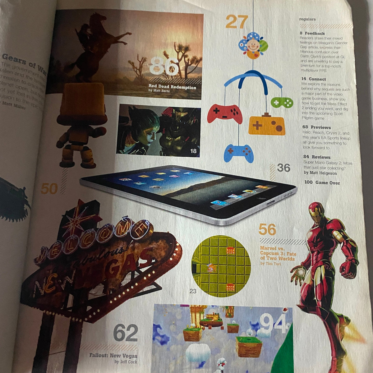 Inside spread of Game Informer Magazine June 2010 Issue 206, showcasing various gaming elements including Red Dead Redemption and Marvel vs Capcom 3, highlighting game previews and reviews.