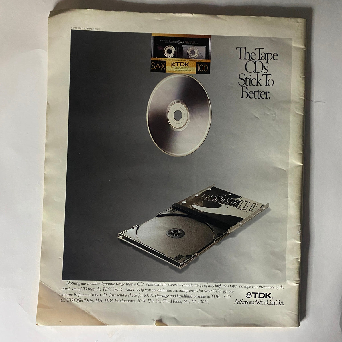 Back cover of Alternative Press Magazine 1990 featuring an advertisement for TDK CDs and tapes, illustrating technology of the era.