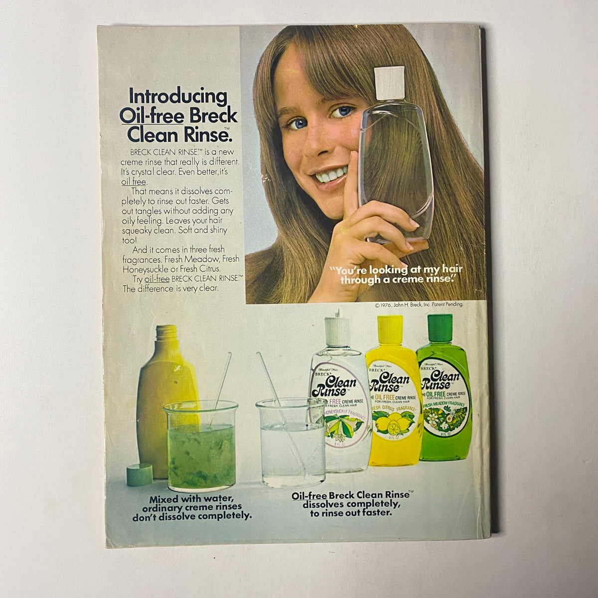 Ad from Seventeen Magazine July 1976 introducing Oil-free Breck Clean Rinse, highlighting its benefits for healthy hair.