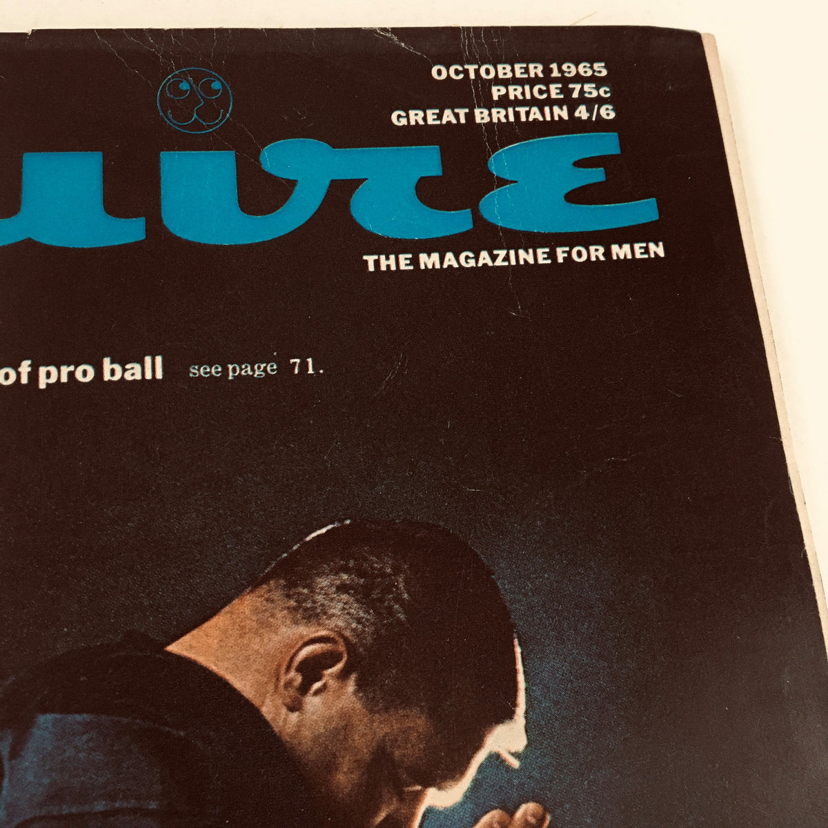 Close-up of Esquire Magazine October 1965 cover, highlighting the magazine title and tagline about pro football.