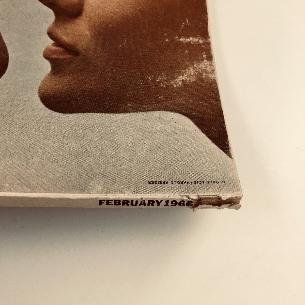Bottom view of the Esquire Magazine February 1966, displaying the publication date and some wear, emphasizing its vintage authenticity.