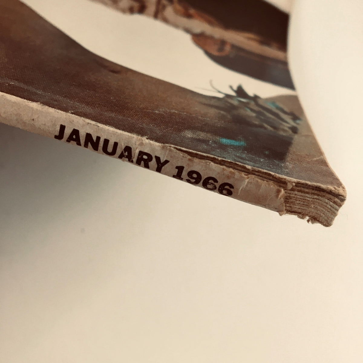 Spine view of Esquire Magazine January 1966, highlighting the publication date and collectible quality of this vintage magazine.