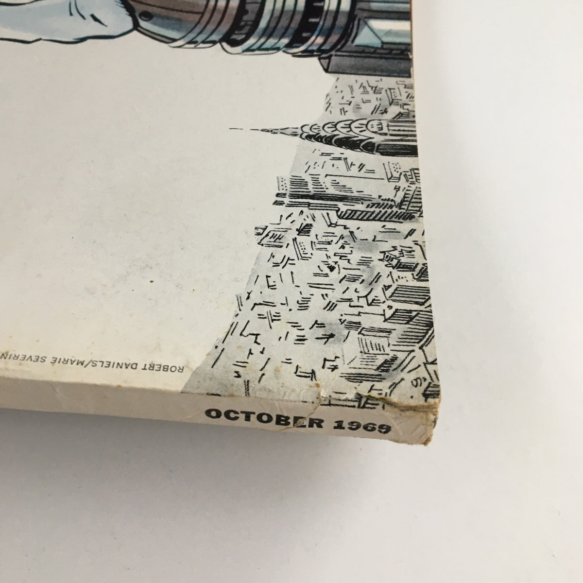 Bottom section of the cover of Esquire Magazine October 1969, showing the publication date and a part of the cityscape illustration.
