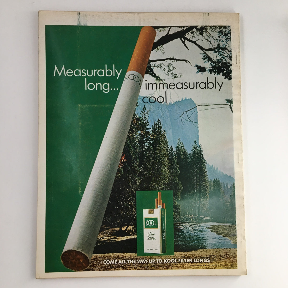 Back cover of Esquire Magazine October 1969, showcasing a vintage advertising layout for Kool cigarettes with scenic background imagery.