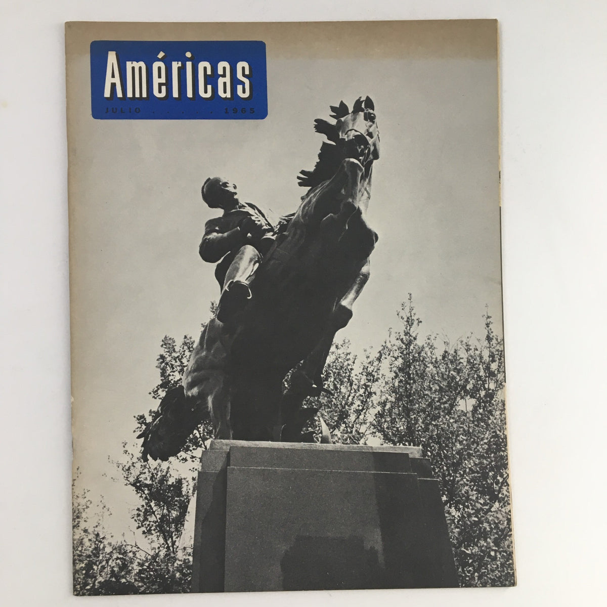 Cover of Americas Magazine July 1965 featuring a striking black and white photograph of a statue of a man on a horse, symbolizing mid-20th century American culture.