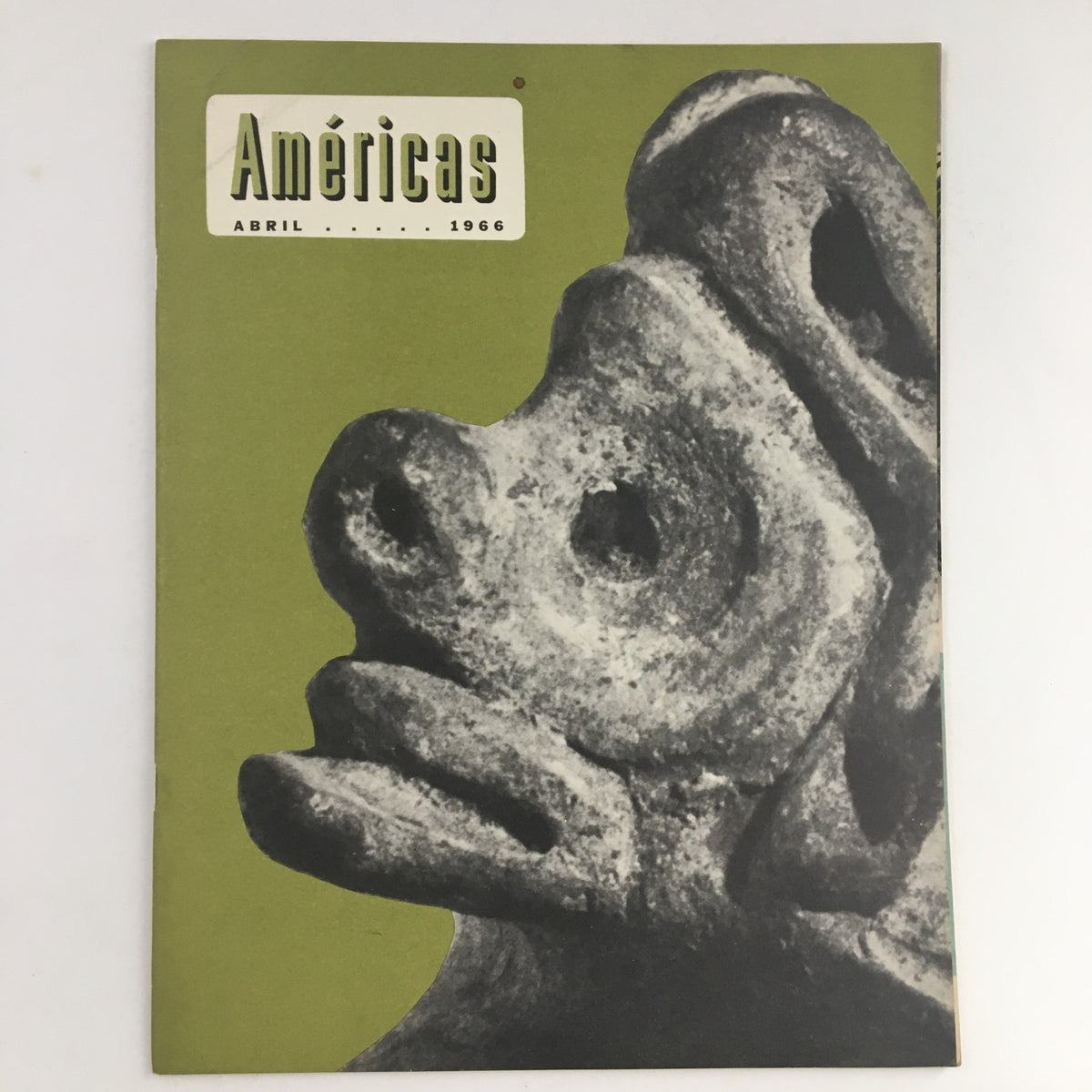 Cover of Americas Magazine, April 1966, featuring a distinctive sculpture and vibrant green background, representing a vintage collectible item from the mid-20th century.