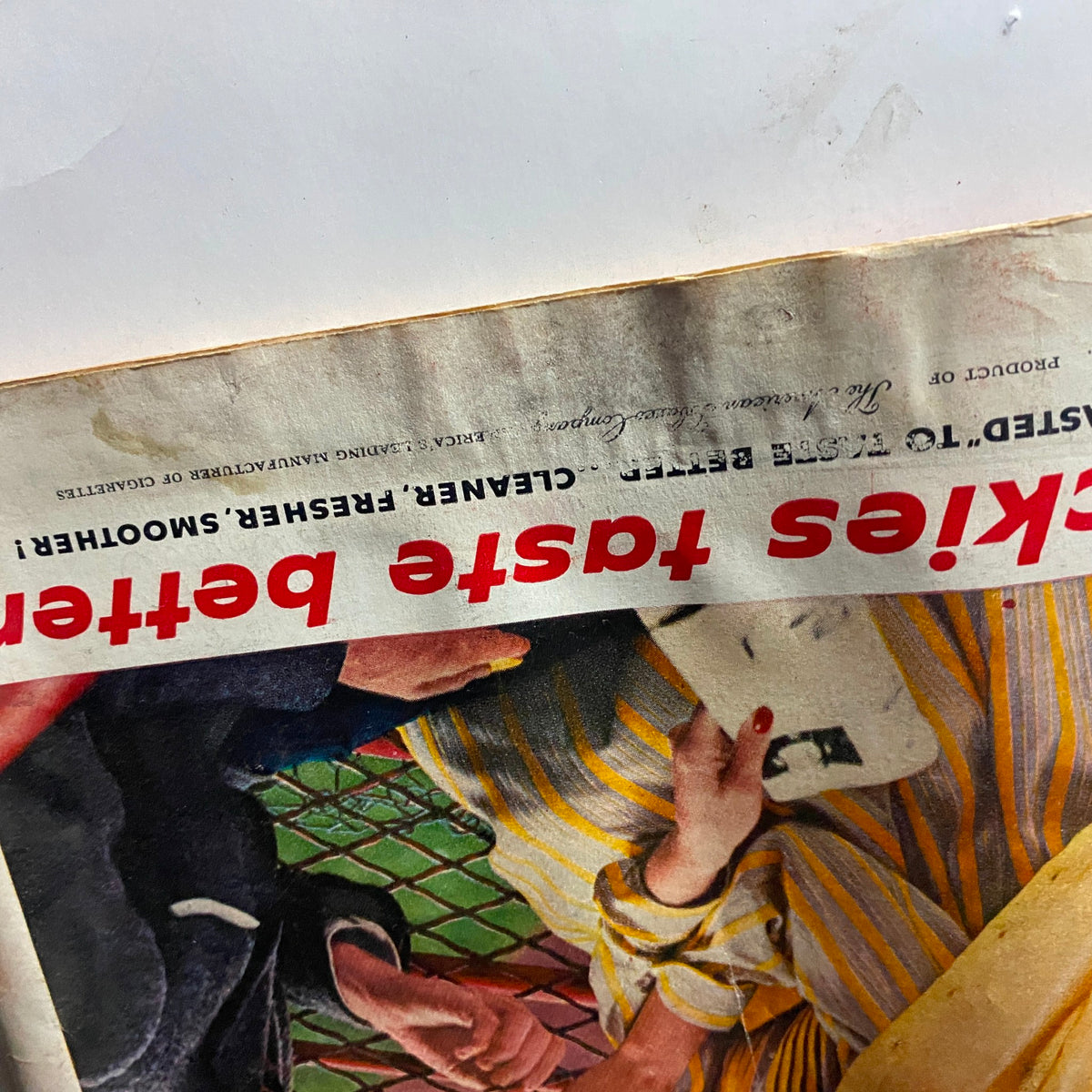 Close-up of Lucky Strike cigarettes advertisement from VTG Time Magazine May 6, 1957 Vol 69 No. 18, emphasizing the slogan 'Luckies taste better.'