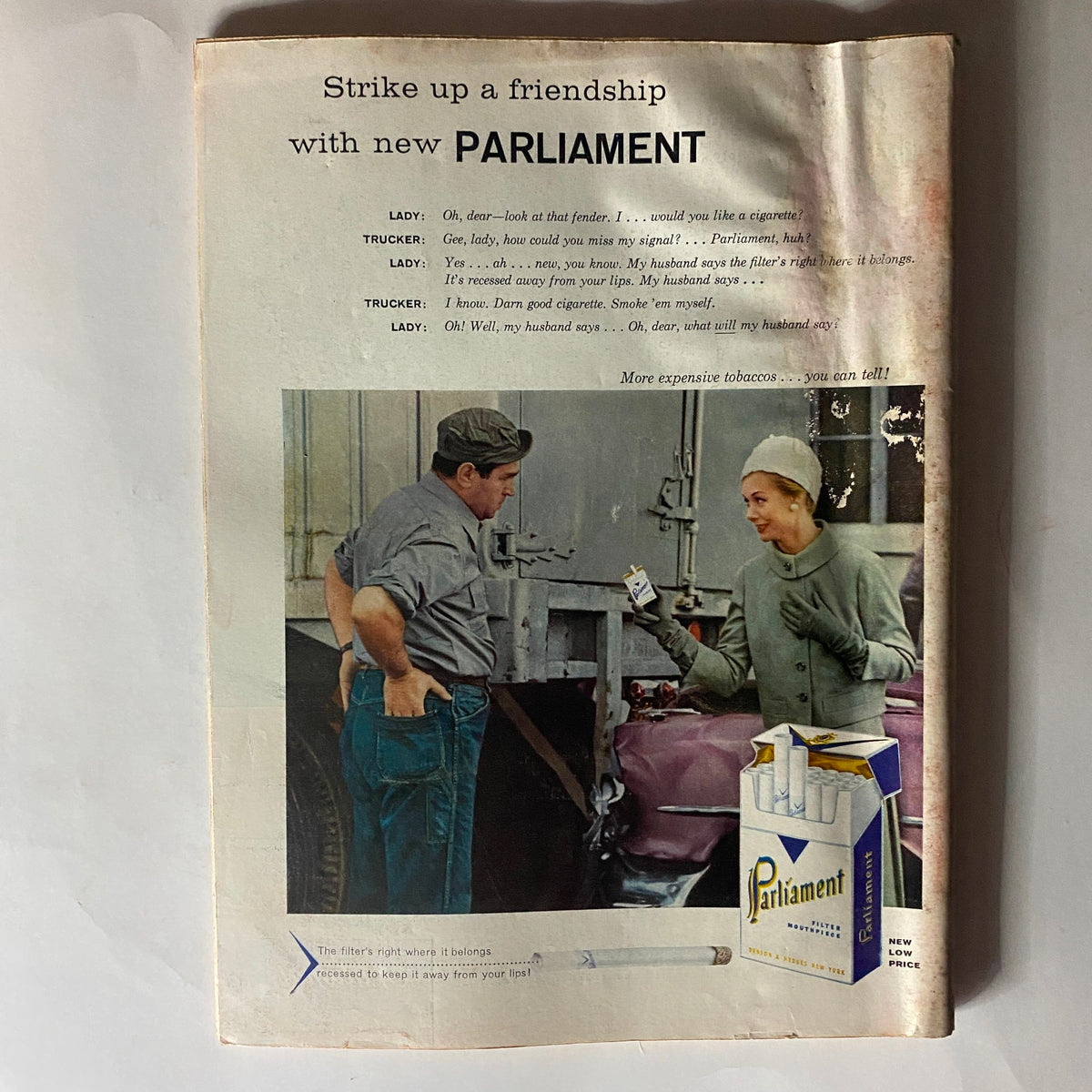 VTG Time Magazine April 15, 1957, highlighting a vintage cigarette advertisement with a conversation between a lady and a trucker, showcasing mid-20th century marketing.