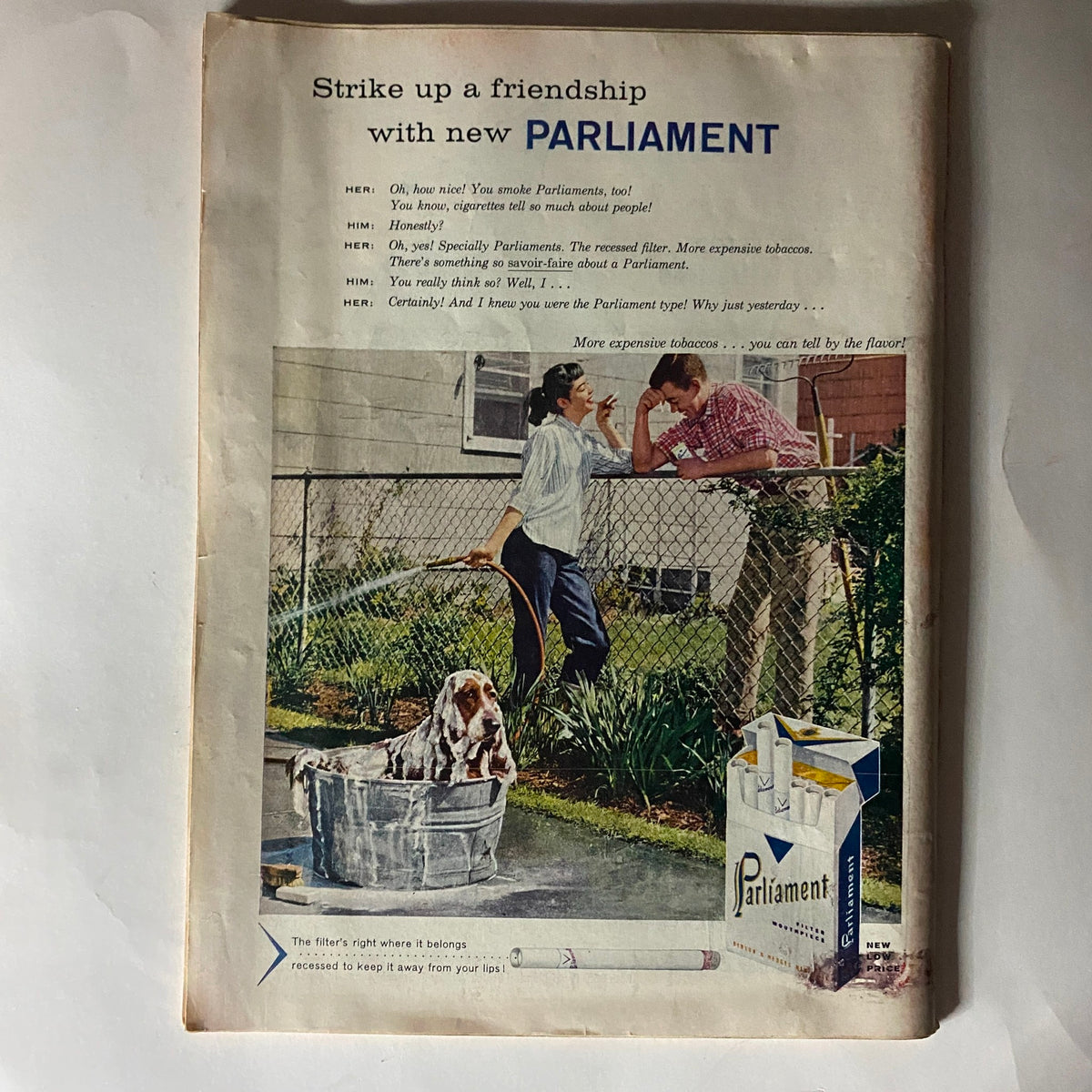 Back page advertisement in VTG Time Magazine September 30, 1957 promoting Parliament cigarettes, highlighting a casual interaction between two individuals.
