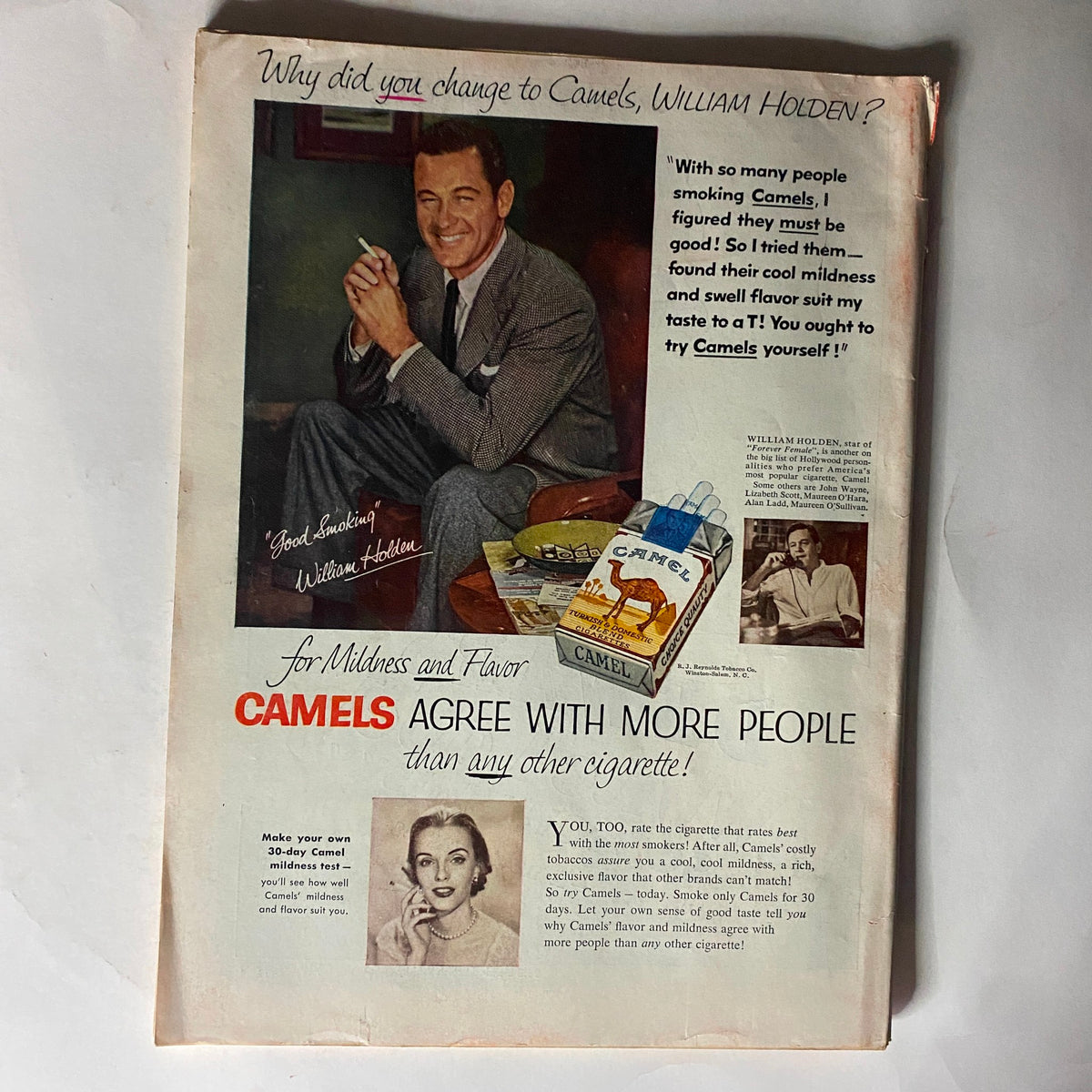 Ad page from VTG Time Magazine January 25, 1954, featuring actor William Holden promoting Camels cigarettes with a promotional message.