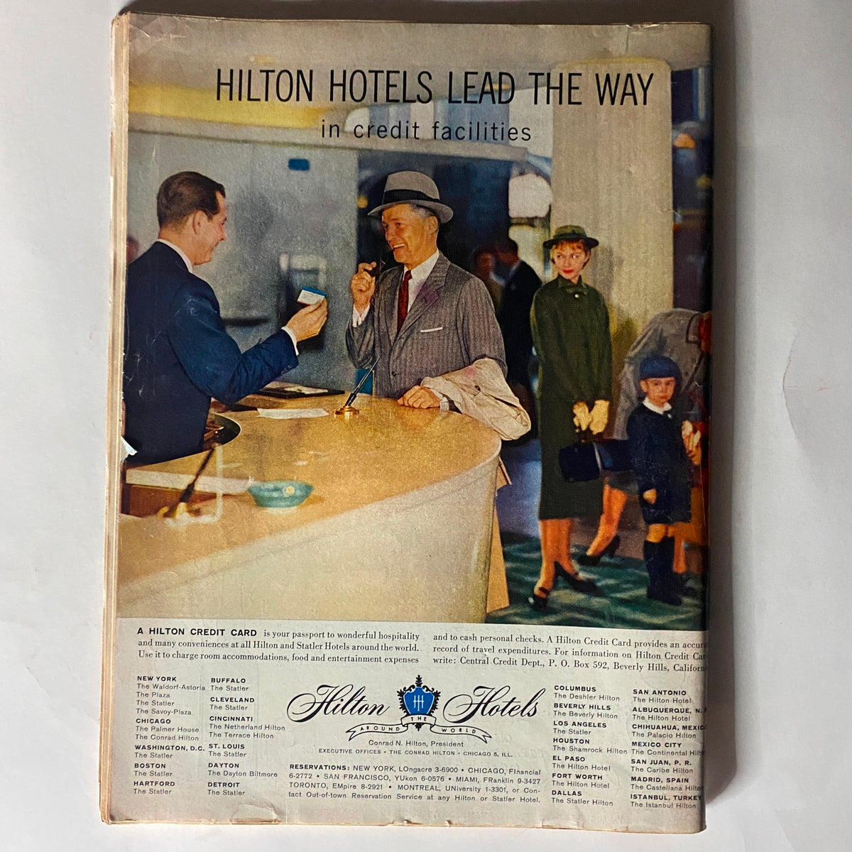 Back cover of VTG Time Magazine October 7, 1957, featuring an advertisement for Hilton Hotels.