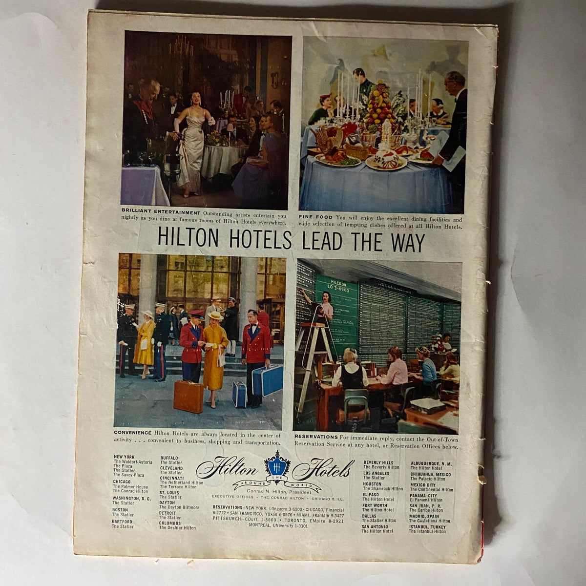 Back cover of Time Magazine January 27, 1958 showcasing an advertisement for Hilton Hotels, highlighting features such as entertainment and dining options available at their establishments.