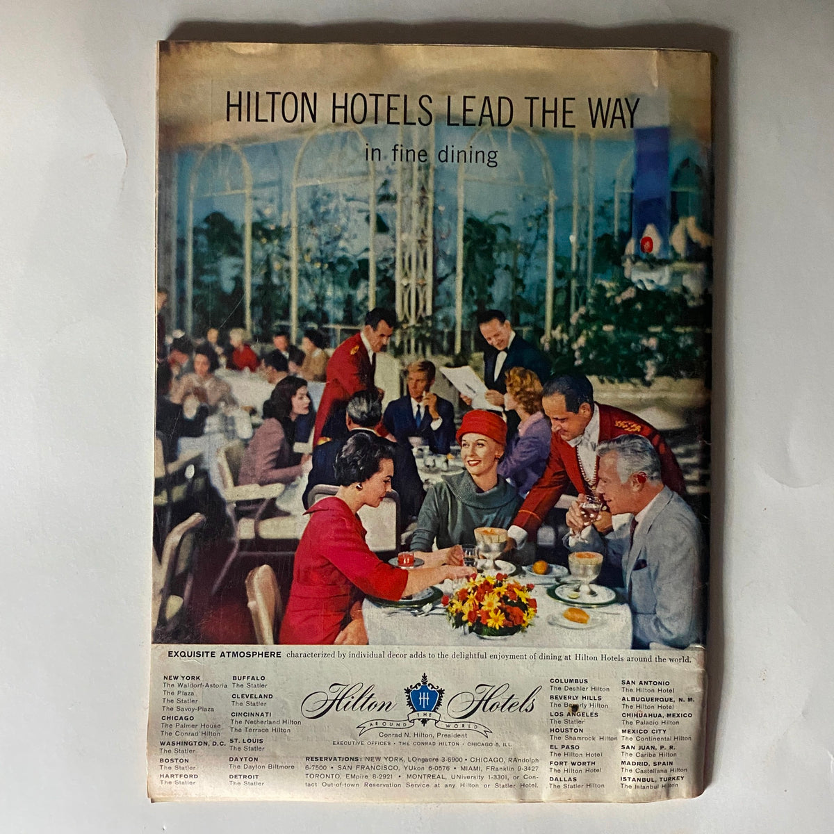Back cover of VTG Time Magazine August 12, 1957 Vol 70 No. 7, advertising Hilton Hotels with a fine dining scene.