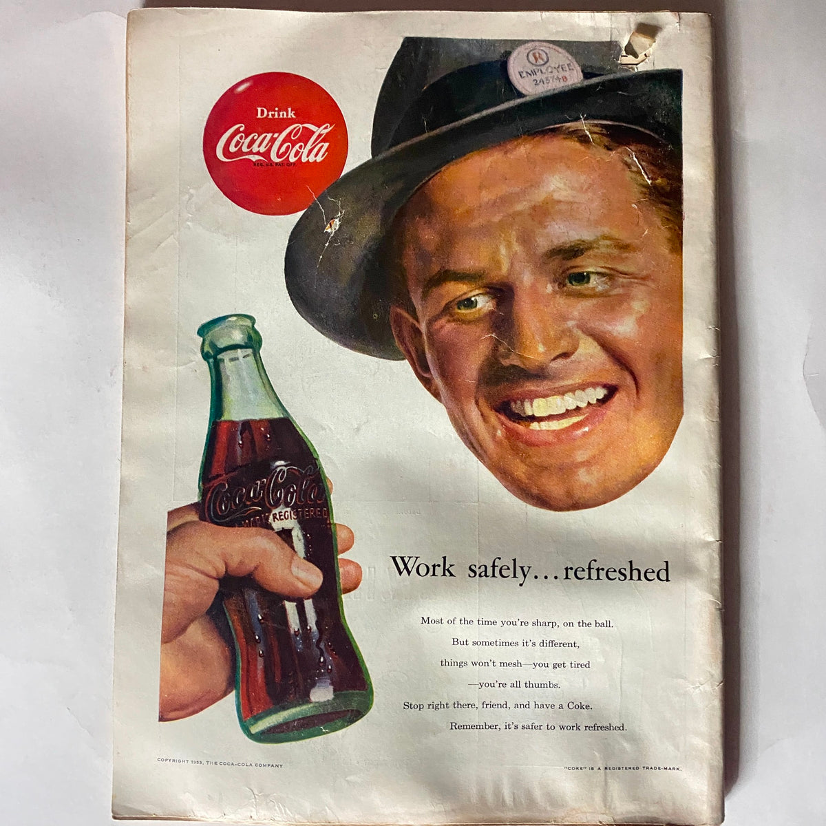 Vintage advertisement from the VTG Time Magazine November 23, 1953 for Coca-Cola, emphasizing the refreshing drink with a smiling man.