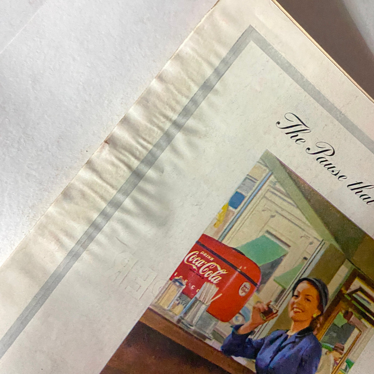 Close-up of the back cover of VTG Time Magazine October 26, 1953 Vol 62 No. 17 highlighting the Coca-Cola ad with a woman smiling, emphasizing the vintage design and layout.