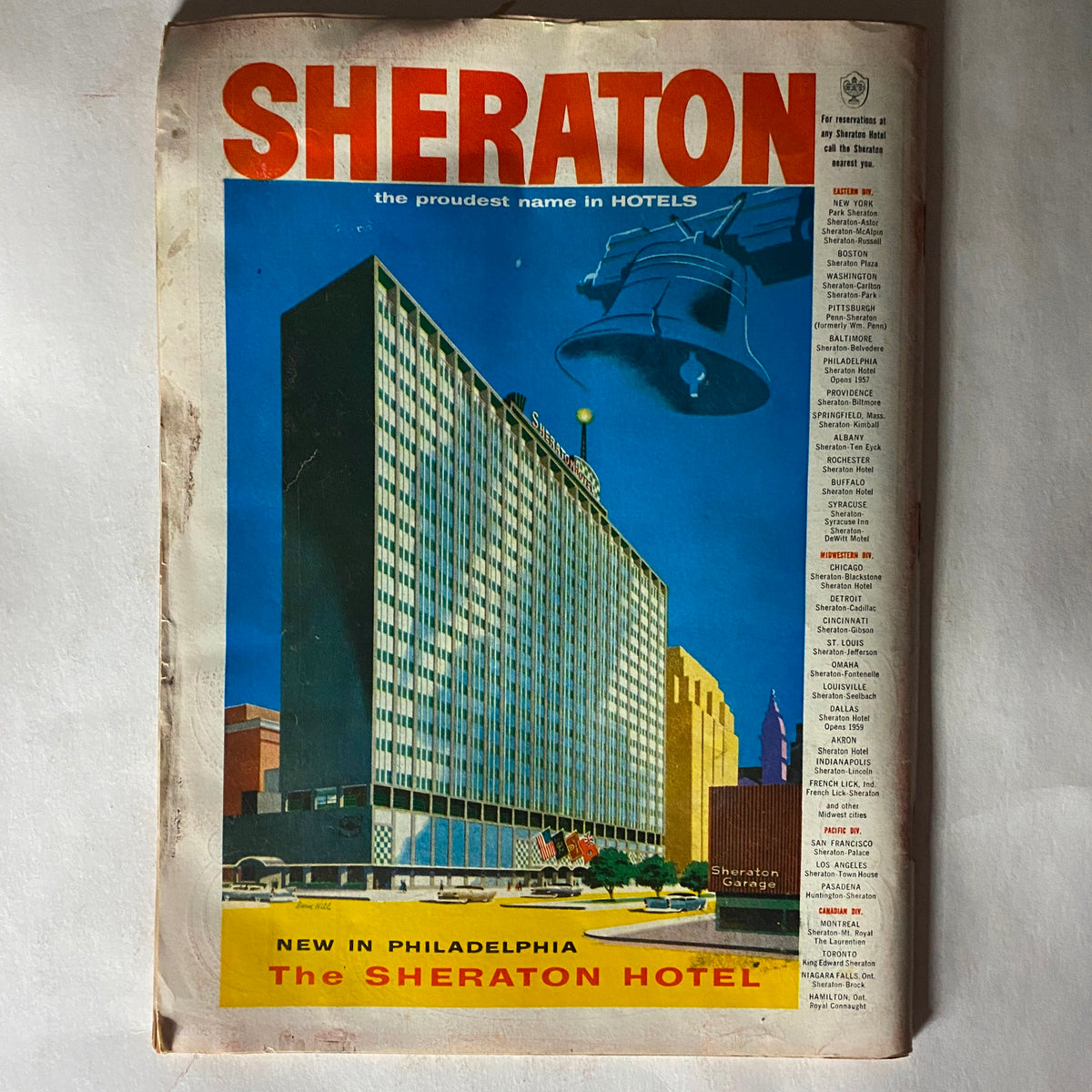 Cover of the Vintage Time Magazine March 4, 1957 Vol 69 No. 9 featuring Christian Dior, showcasing a colorful image of the Sheraton Hotel.