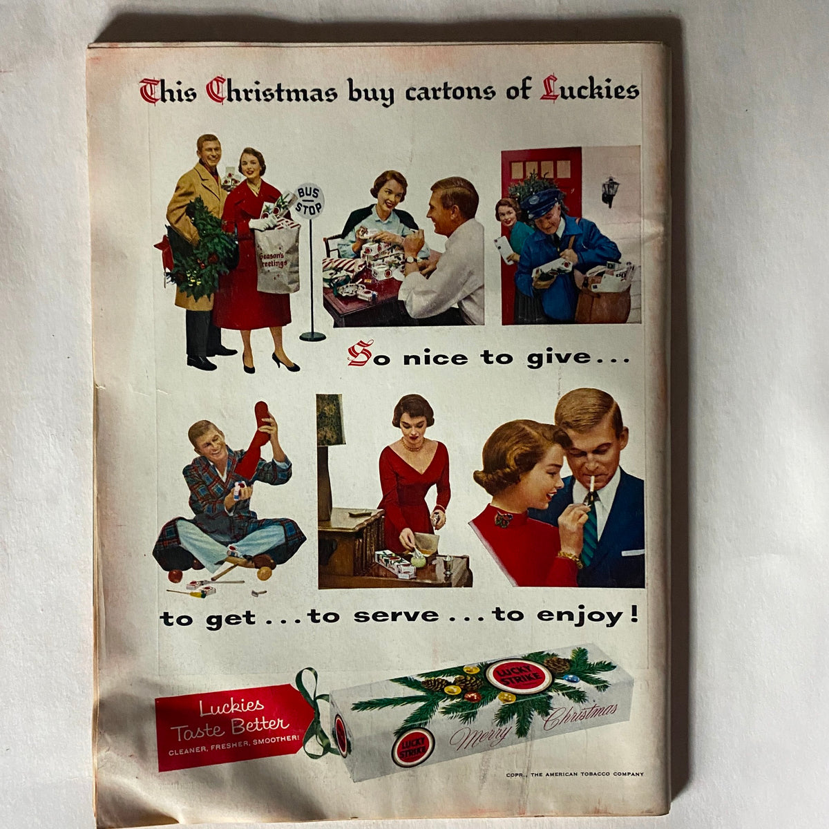 Back cover advertisement from VTG Time Magazine December 10, 1956 featuring festive imagery and promoting Lucky Strike cigarettes for the holidays.