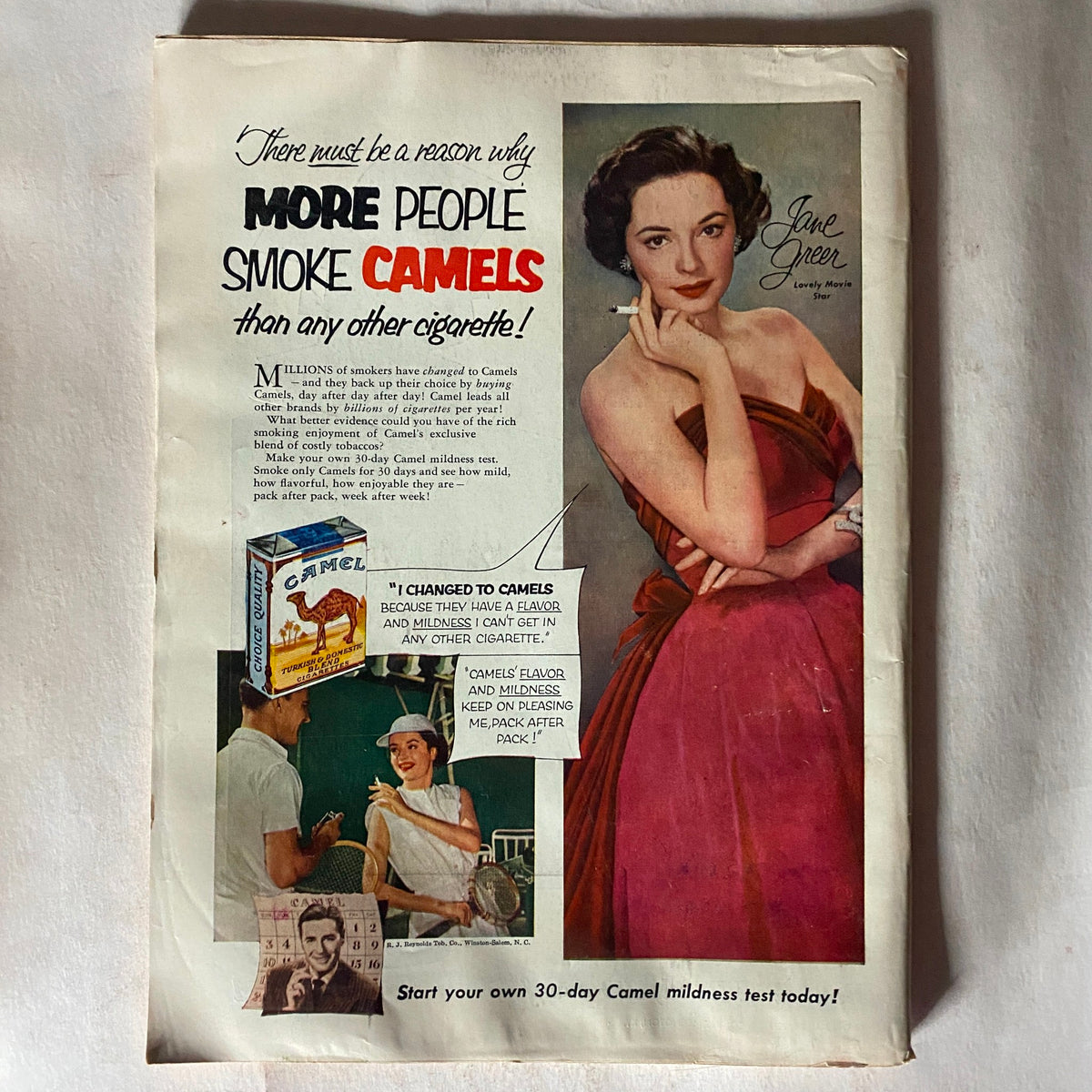 Advertisement from VTG Time Magazine May 18, 1953 promoting Camel cigarettes, featuring a model and highlighting brand appeal in mid-20th century America.