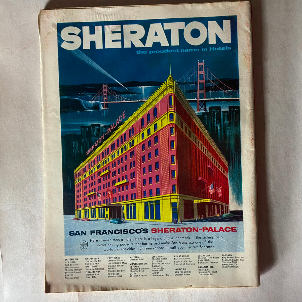 Advertisement page from July 23, 1956 Vintage Time Magazine promoting Sheraton-Palace Hotel in San Francisco.