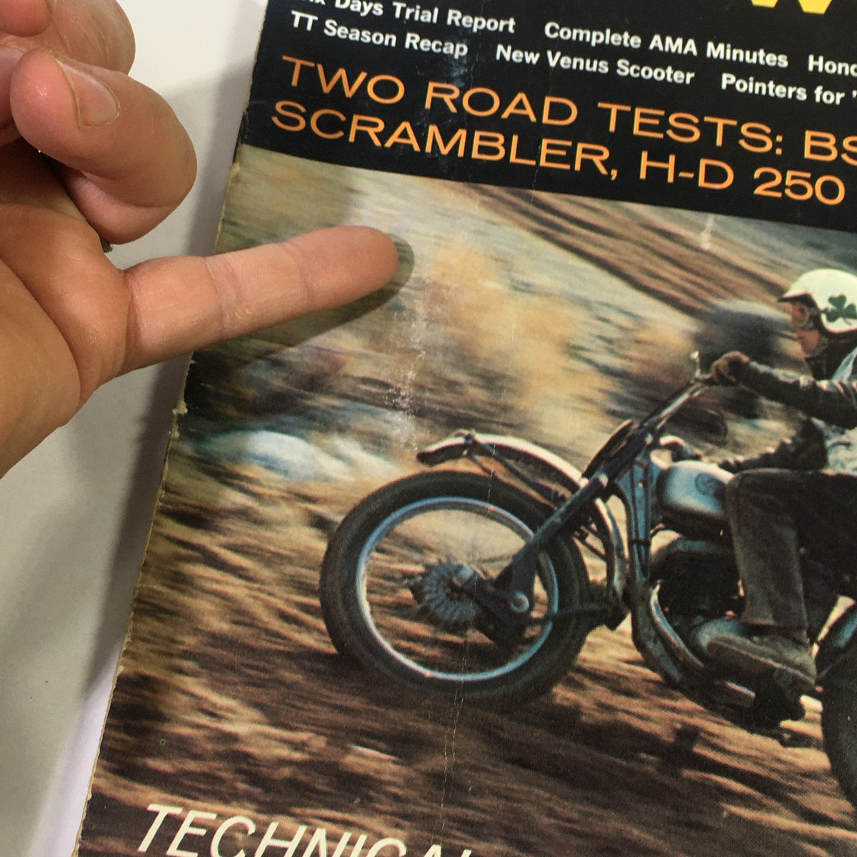 Close-up of the cover of VTG Cycle World Magazine February 1962, highlighting the BSA Catalina Scrambler and H-D 150 Sprint with technical information.