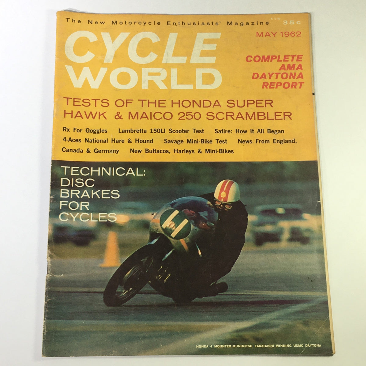 Cover of VTG Cycle World Magazine May 1962 featuring tests of the Honda Super Hawk and Maico 250 Scrambler, showcasing a motorcycle in action.