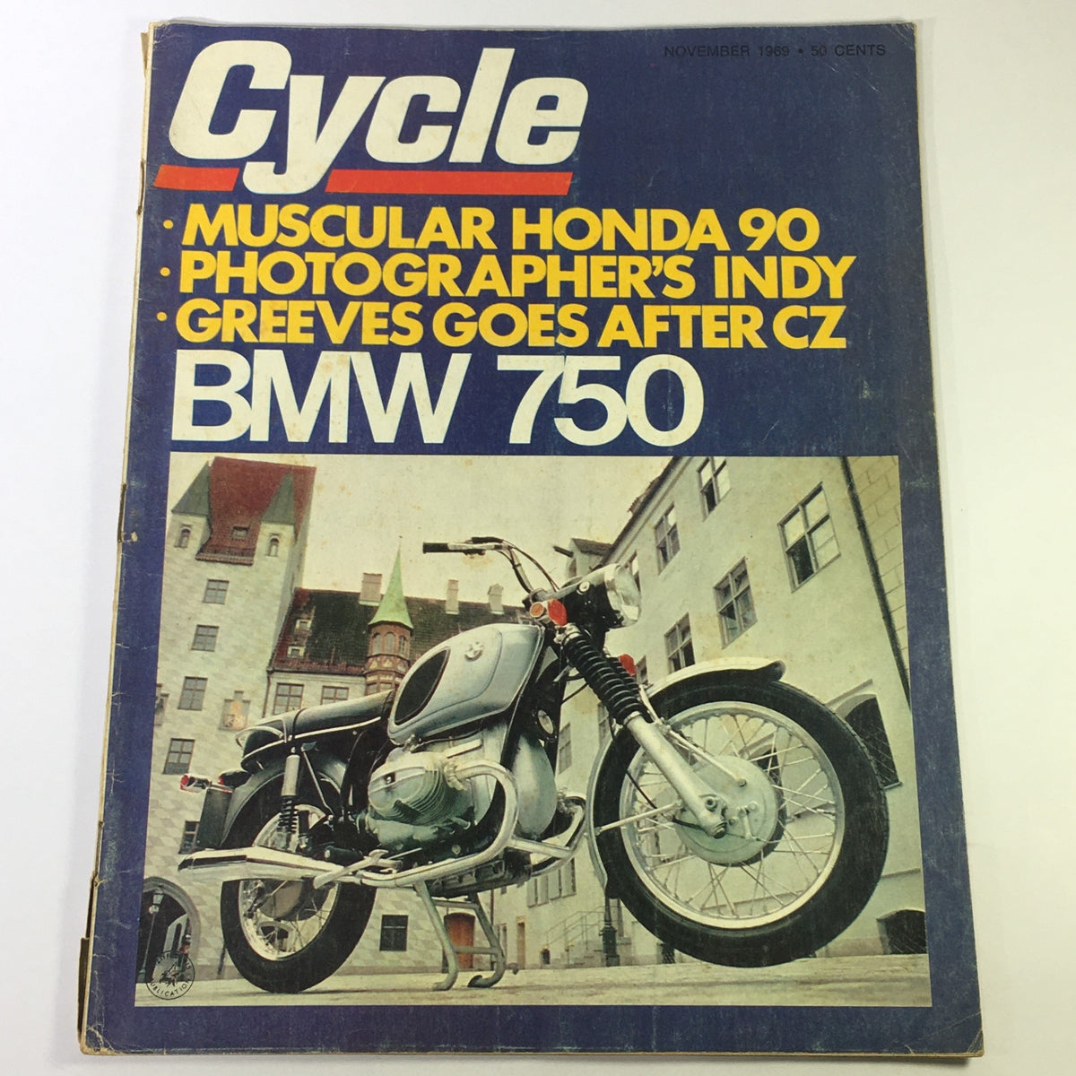 Cover of Cycle Magazine November 1969 featuring a muscular Honda 90 and BMW 750, showcasing a vintage motorcycle theme.