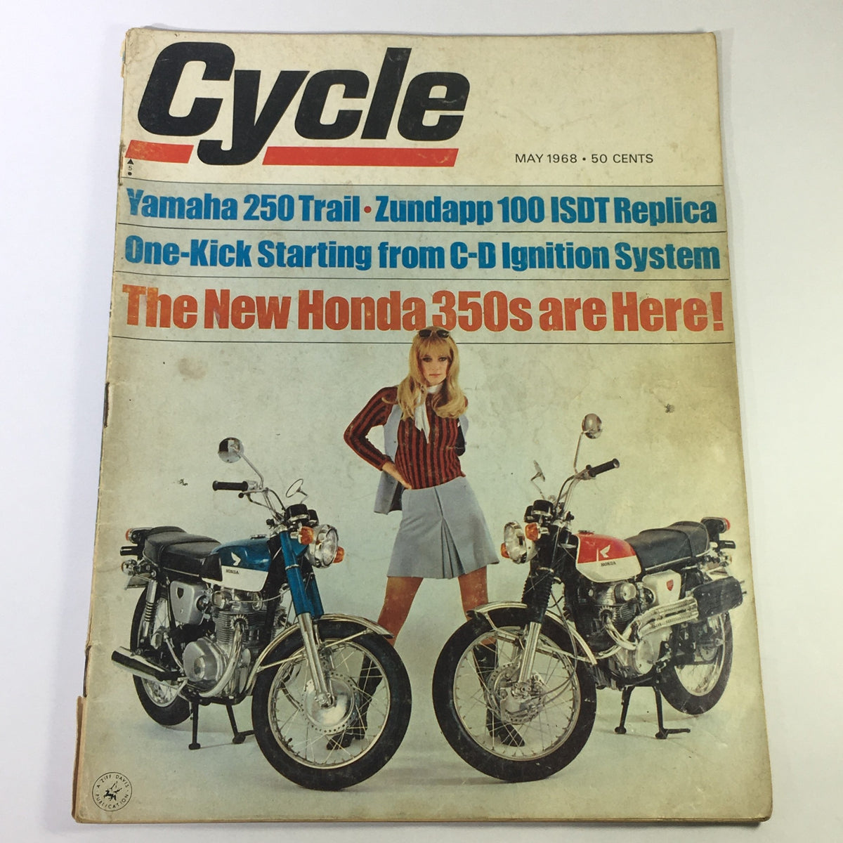 Vintage Cycle Magazine May 1968 cover featuring the Yamaha 250 Trail and Zundapp 100 ISDT Replica with a model posing with the motorcycles.