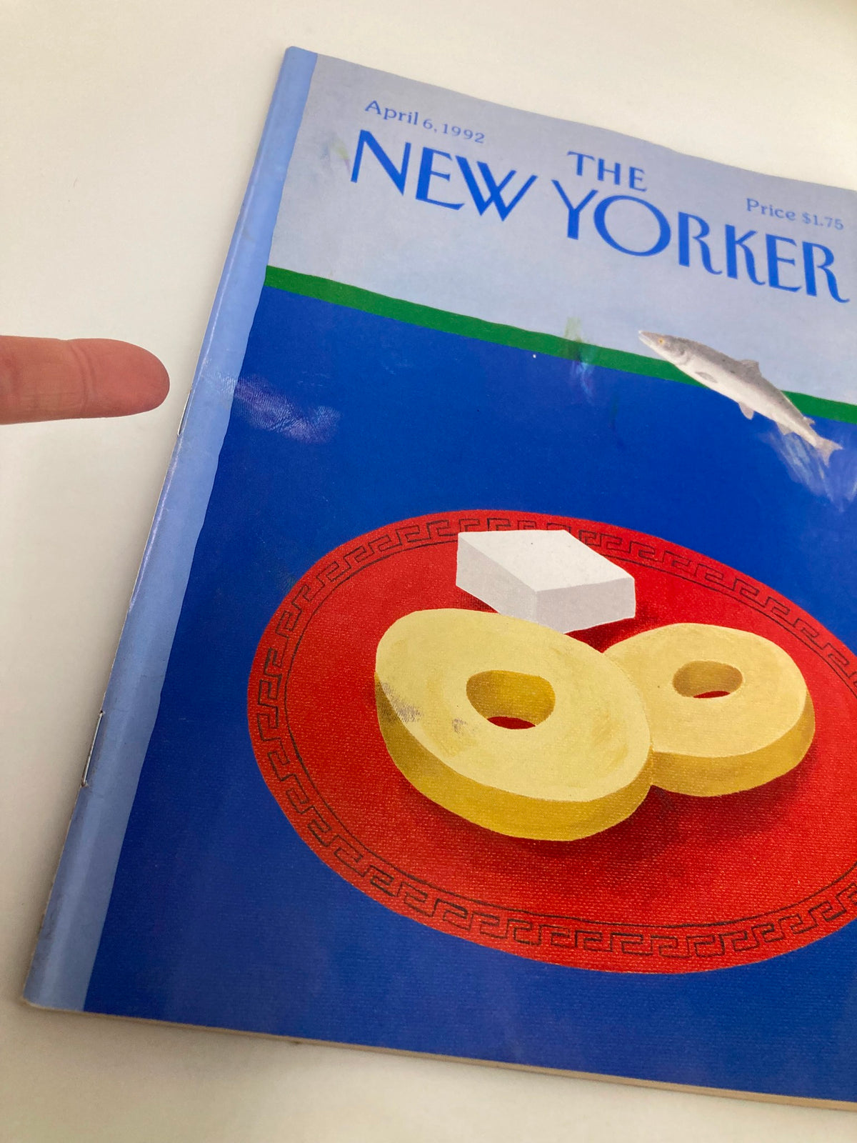 Close-up of The New Yorker Full Magazine April 6, 1992 cover showcasing 'Fish Cheese' cover art by Heidi Goennel, emphasizing the vibrant colors and unique design.