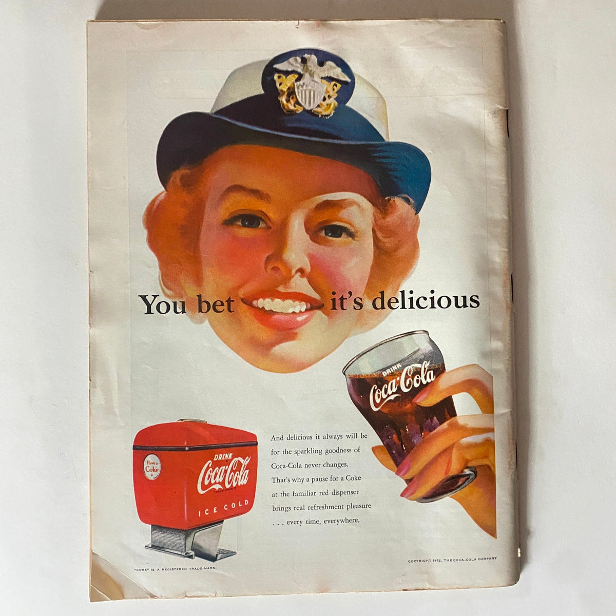 Advertisement in VTG Time Magazine October 27, 1952 Vol 60 No. 17 featuring a woman in a sailor hat promoting Coca-Cola with the text 'You bet it's delicious'.