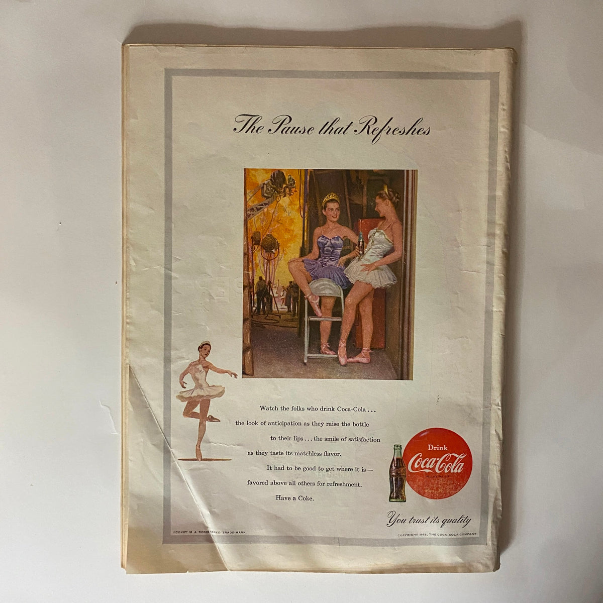Inside page of VTG Time Magazine April 13, 1953 featuring a Coca-Cola advertisement, showcasing a nostalgic illustration and vintage marketing style.