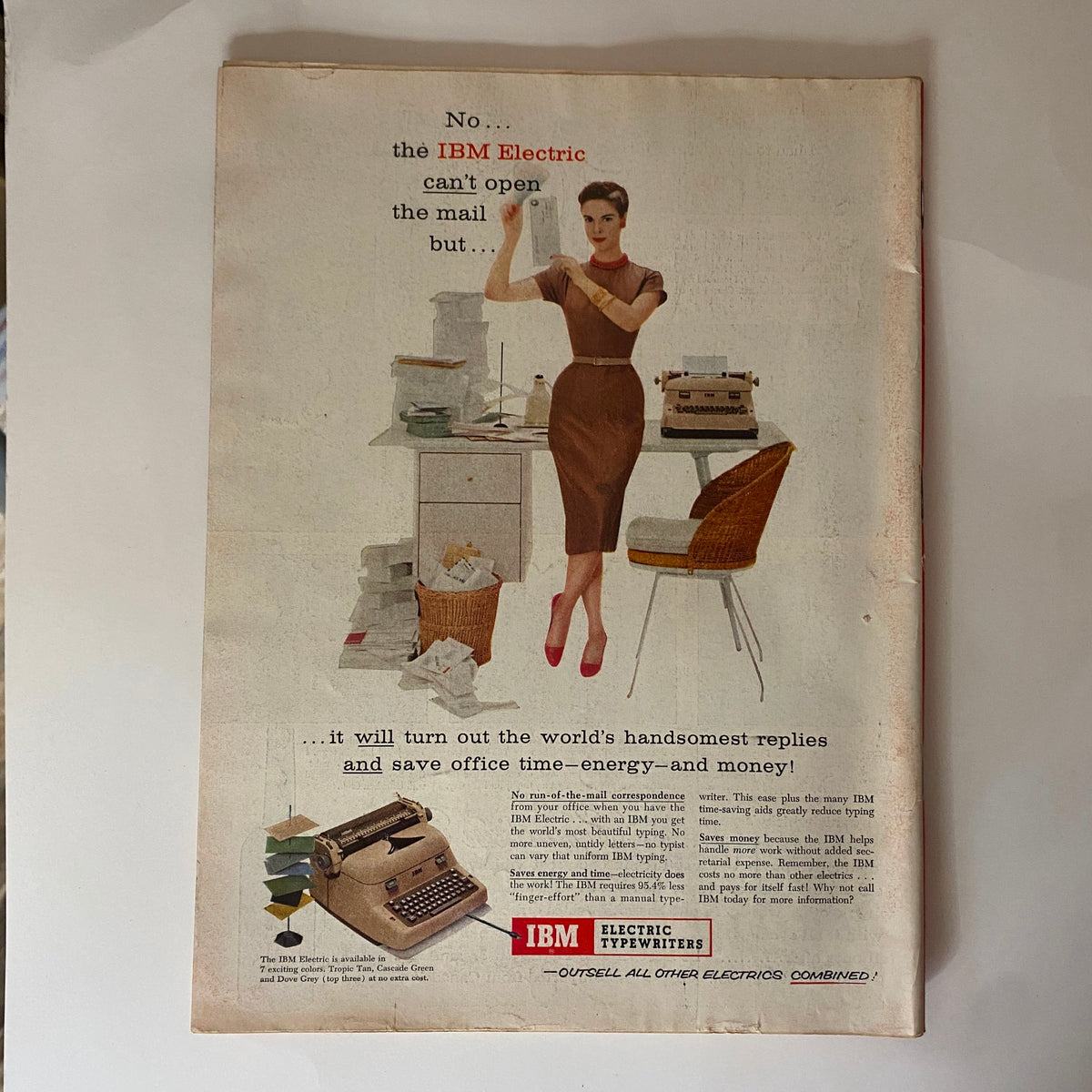 Advertisement page from VTG Time Magazine July 16, 1956 featuring IBM Electric Typewriters, highlighting a woman in vintage attire promoting efficient office solutions.