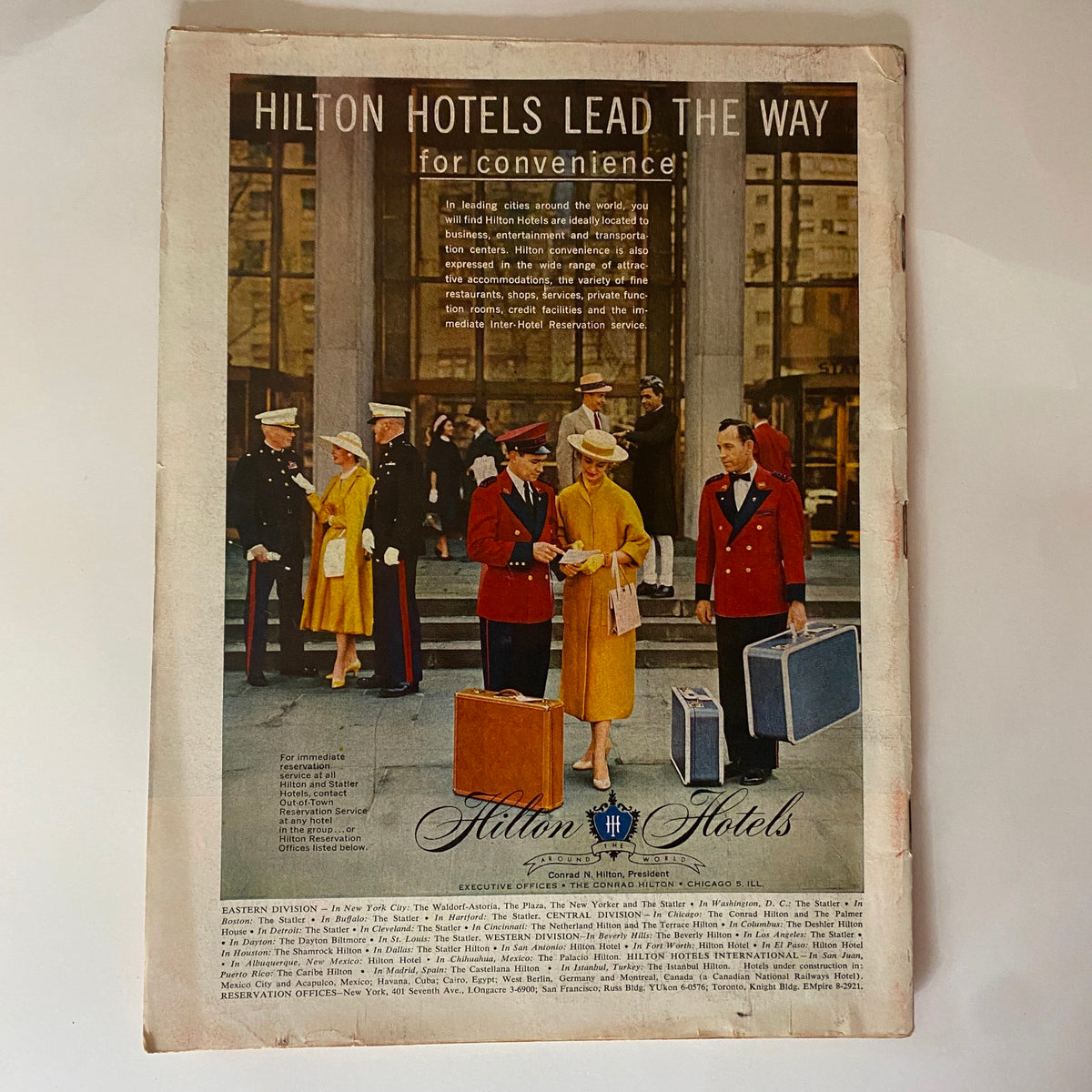 Back cover of the Vintage Time Magazine from July 9, 1956, featuring an advertisement for Hilton Hotels promoting convenience and luxury travel.