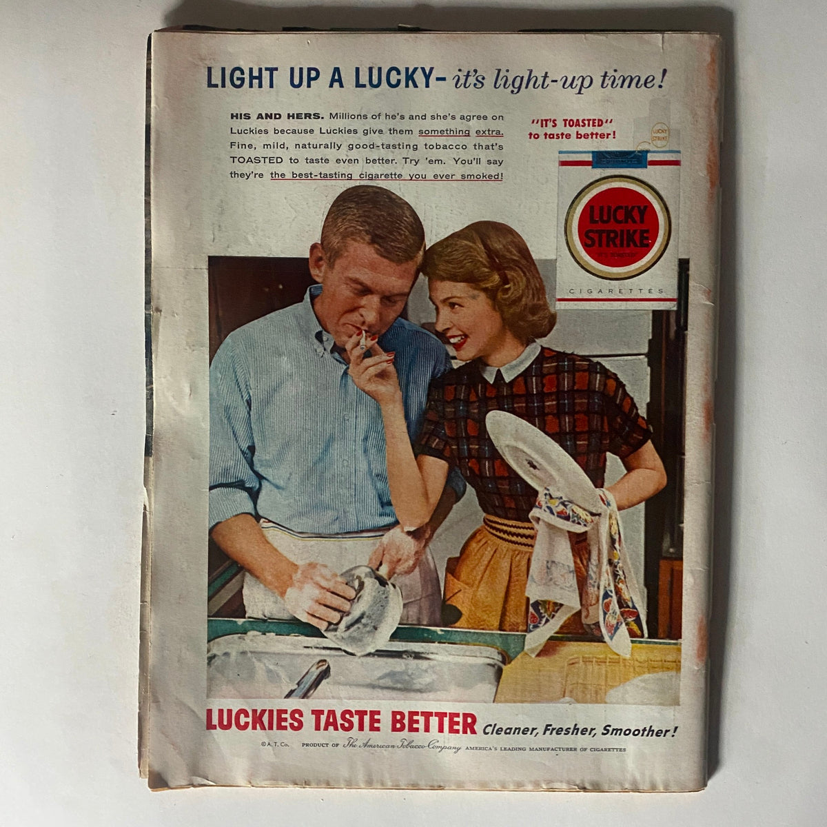 Vintage advertisement from Time Magazine March 5, 1956 Vol 67 No. 10 featuring a couple enjoying a moment together while promoting Lucky Strike cigarettes with the slogan 'Luckies Taste Better'. This nostalgic image captures the essence of mid-20th century advertising.