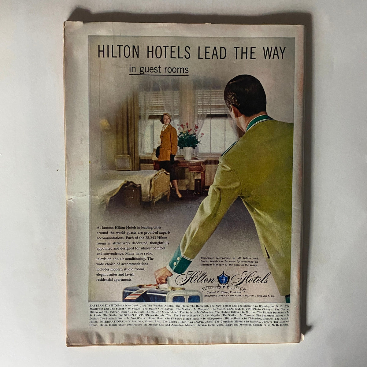 Advertisement page from VTG Time Magazine February 20, 1956, promoting Hilton Hotels and their guest room accommodations.