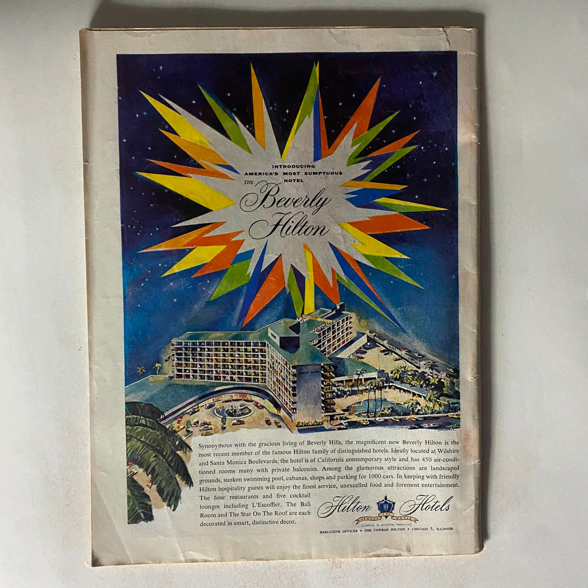 Advertisement page in VTG Time Magazine August 15, 1955 featuring the Beverly Hilton hotel, capturing the luxury and lifestyle of the 1950s.