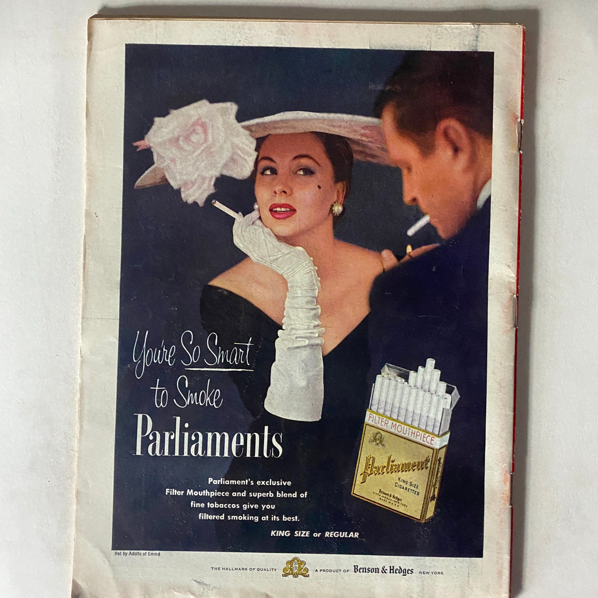 Advertisement from the VTG Time Magazine July 4, 1955 featuring a stylish woman promoting Parliament cigarettes, highlighting mid-20th century fashion and lifestyle.