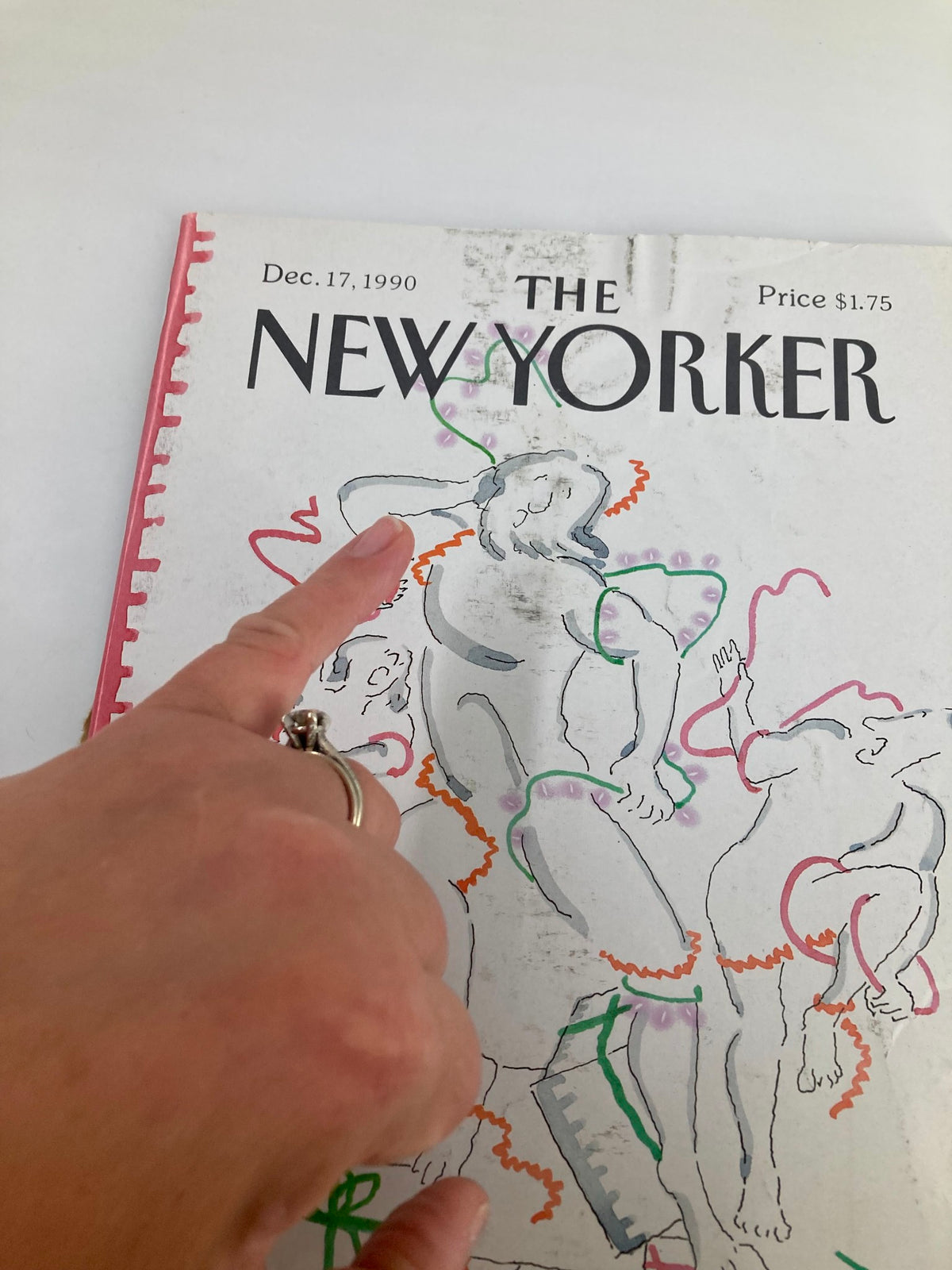 Detail of The New Yorker Full Magazine December 17, 1990 cover, with a hand pointing to R. O. Blechman's illustration, highlighting its artistic features.