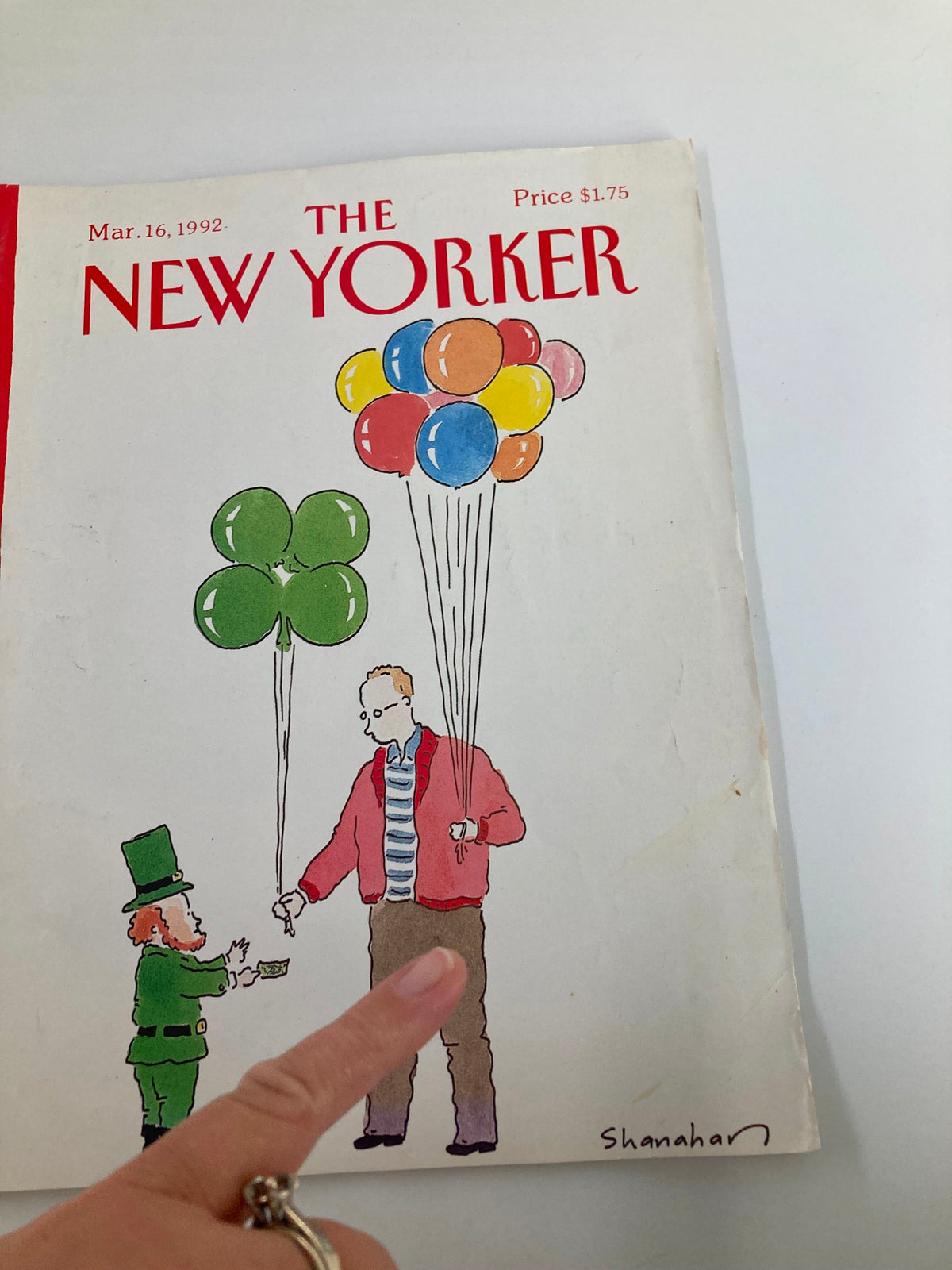 Close-up view of the cover of The New Yorker Full Magazine March 16 1992, highlighting the illustration by Danny Shanahan with a focus on the leprechaun and balloon details.
