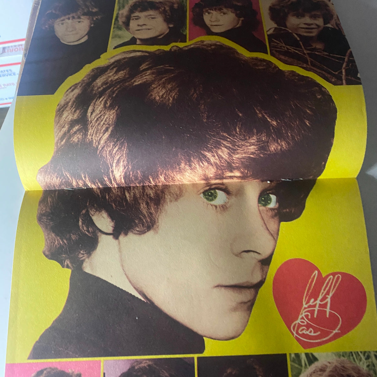 Page from VTG 16 Magazine December 1973 featuring a portrait of a young male celebrity with curly hair and bright green eyes, against a colorful background, part of the collectible issue Vol 15 No. 7.