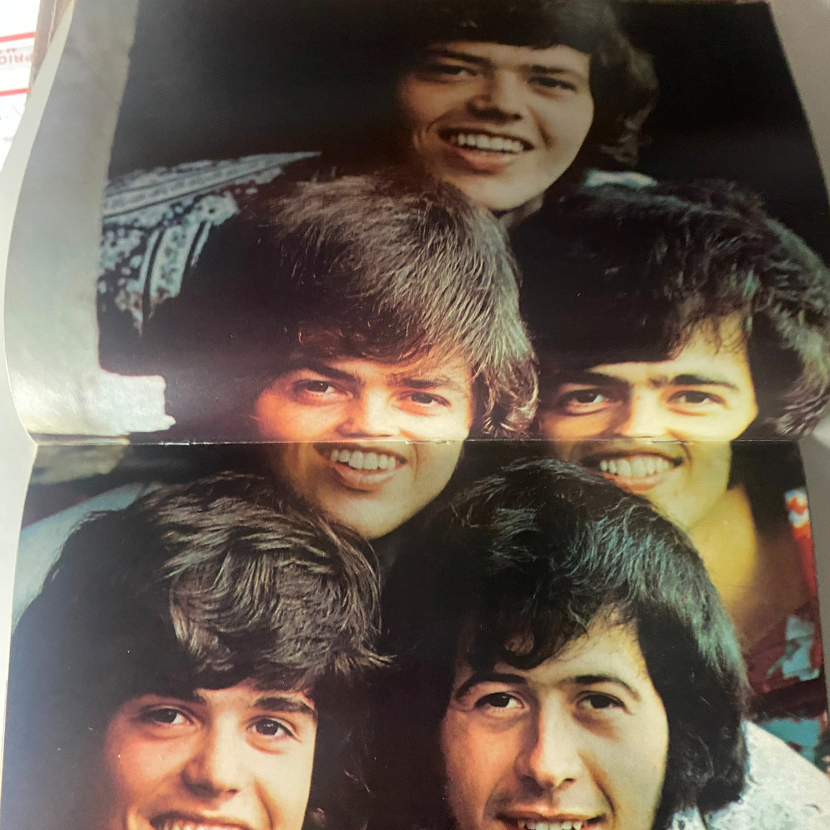Two pages from VTG 16 Magazine Summer 1973 Vol 1 No. 1 showing a fun candid group photo of the Osmonds, highlighting their youthful charm and popularity during the 1970s.