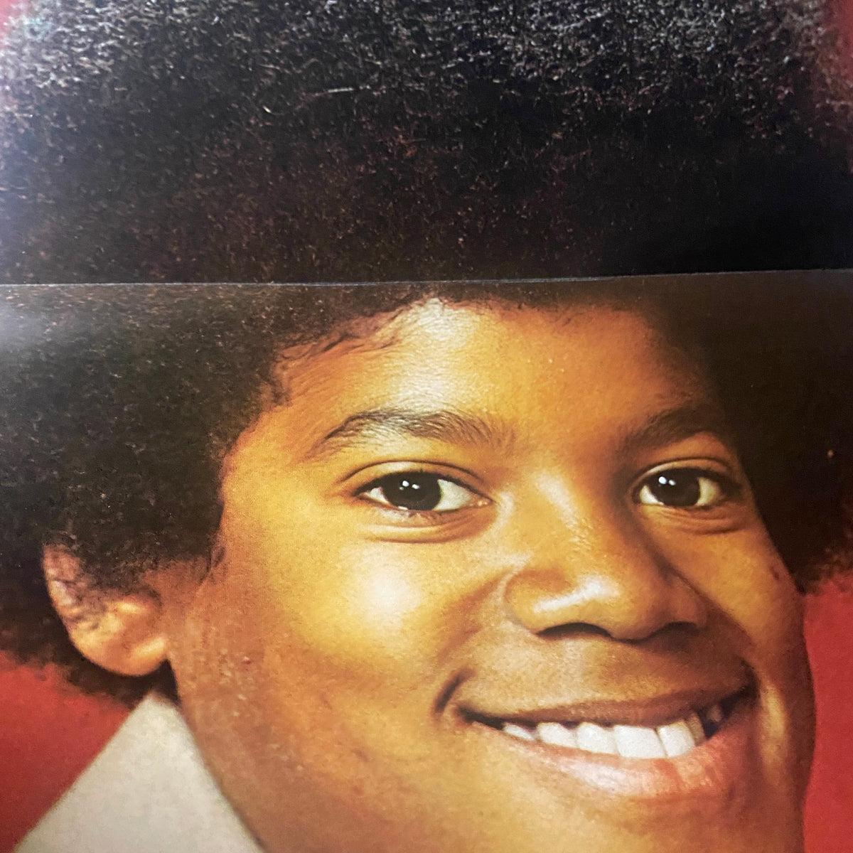 Fold-out image from VTG 16 SPEC Magazine March 1973 showing a smiling portrait of a young star with an afro hairstyle.