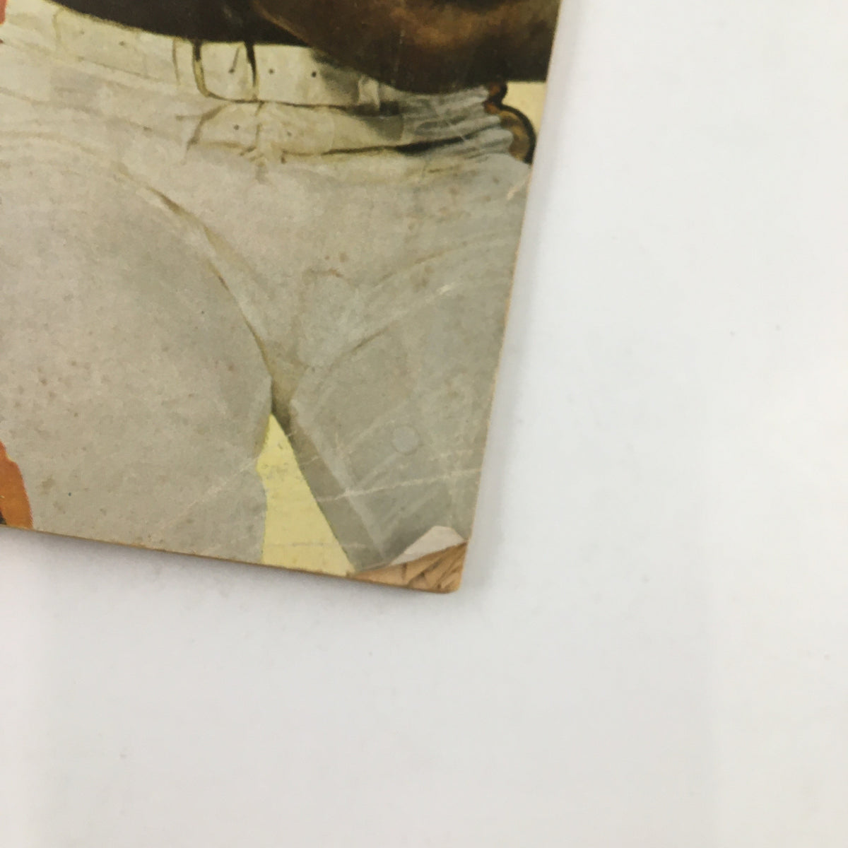 Close-up of the corner of Sport Magazine December 1962 featuring the edge condition, indicating wear typical of collectible vintage magazines.
